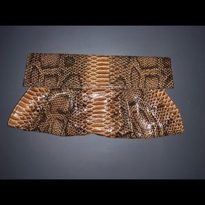 Brown faux snake skin clutch